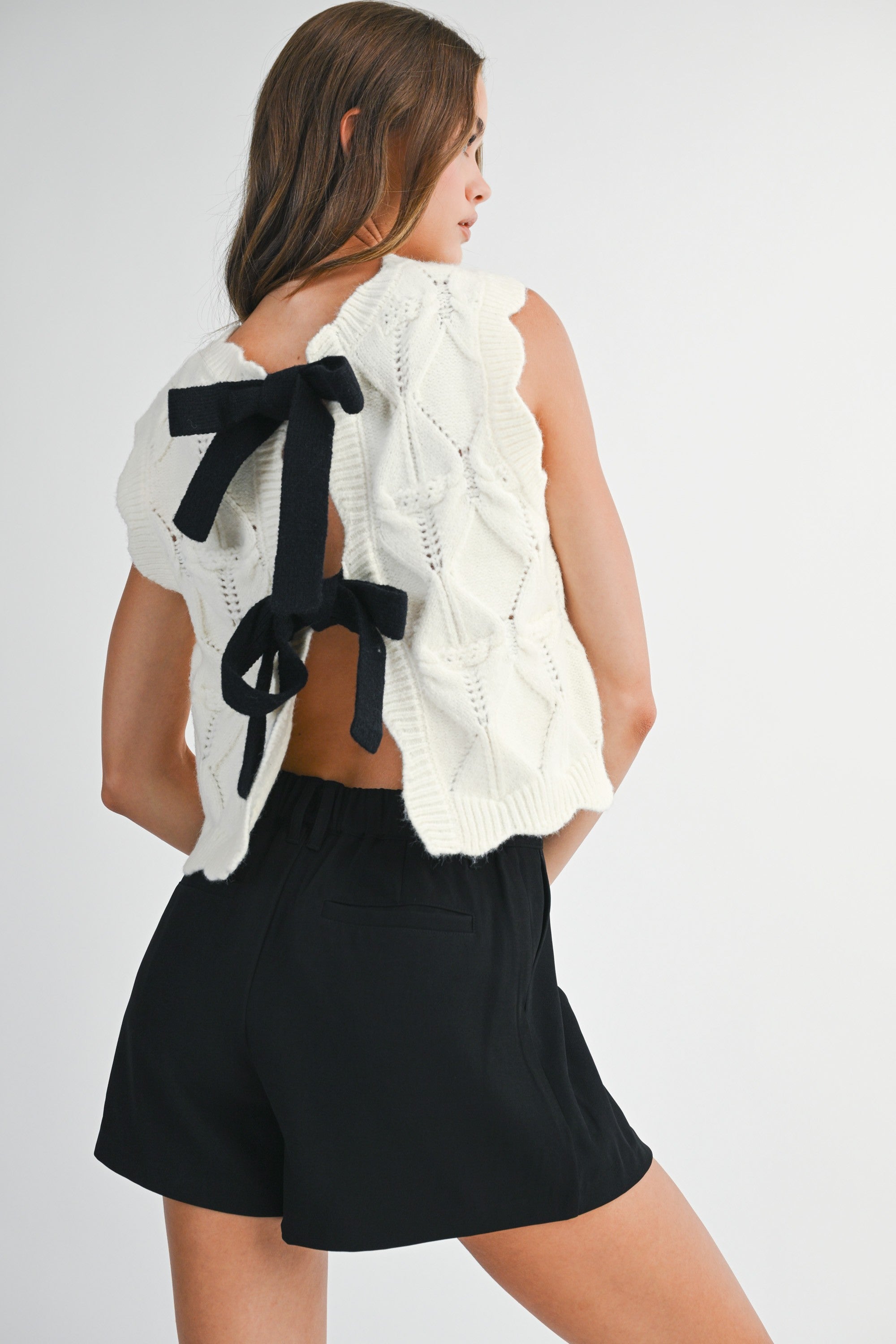 Mable Cable Knit Scalloped Vest With Contrast Bow Tie