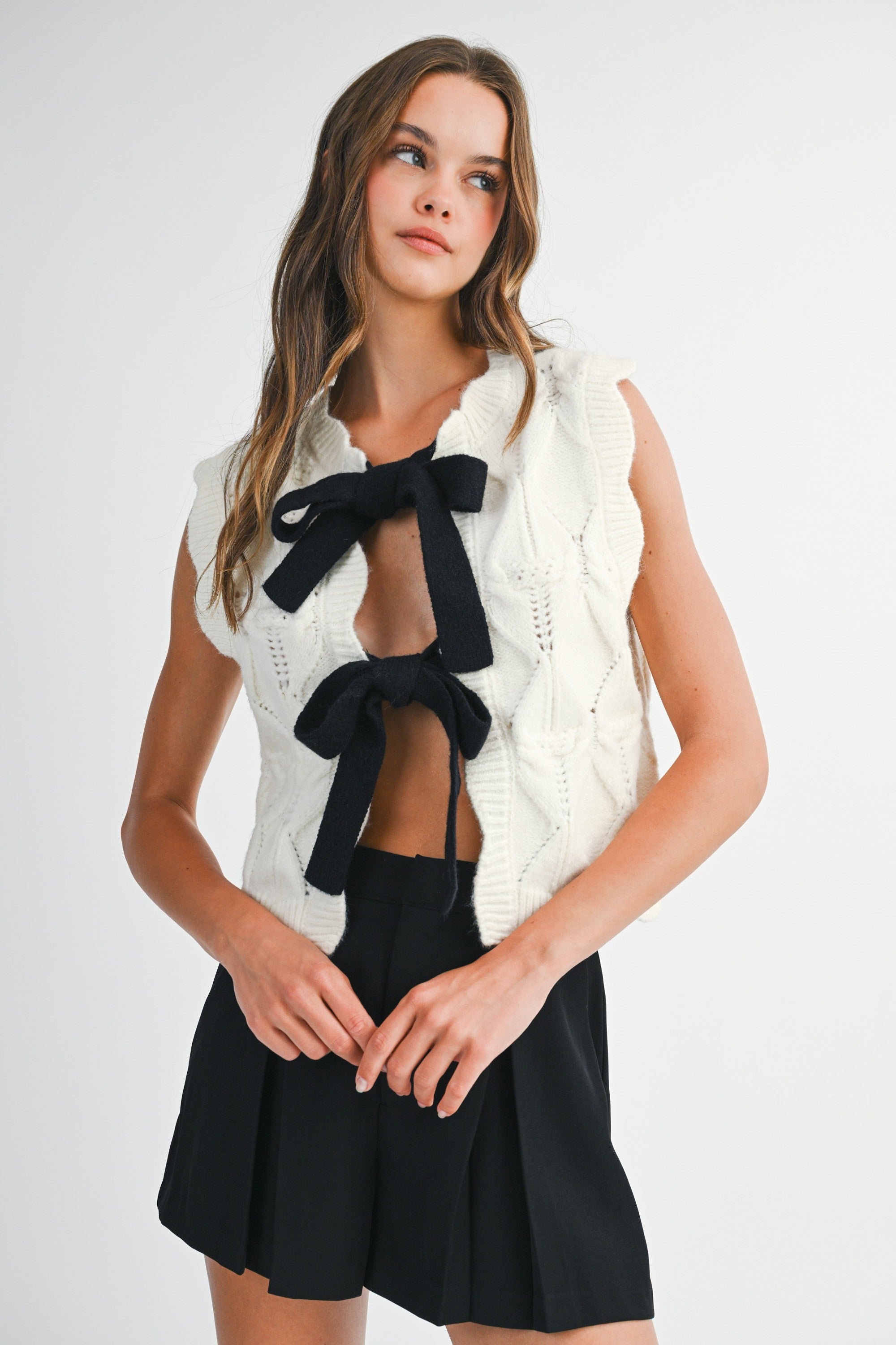 Mable Cable Knit Scalloped Vest With Contrast Bow Tie