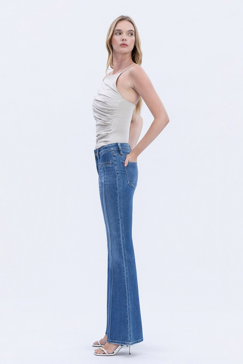 Vervet Mid Rise Welt Pocket Pin Tuck Flare Jeans