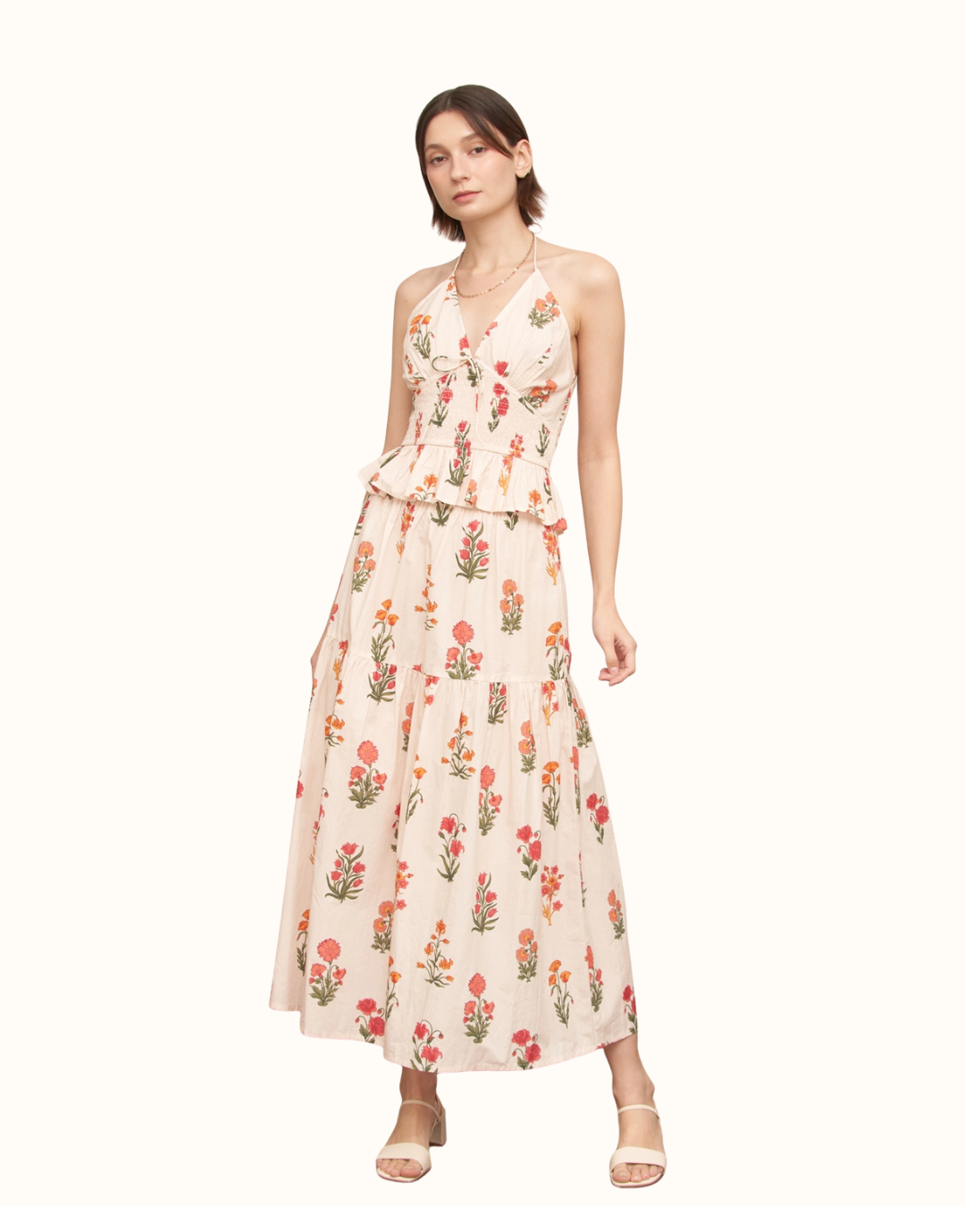 En Crème Floral V-Neck Peplum Top